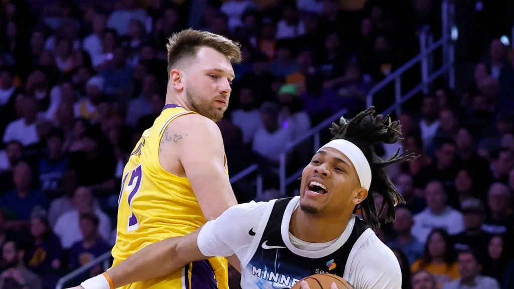Terrence Shannon Jr. #00 of the Minnesota Timberwolves reacts as he drives to the basket on Luka Doncic #77 of the Los Angeles Lakers