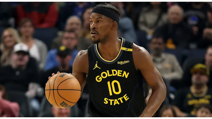 Jimmy Butler III #10 of the Golden State Warriors dribbles the ball against the Charlotte Hornets at Chase Center on February 25, 2025 in San Francisco, California.