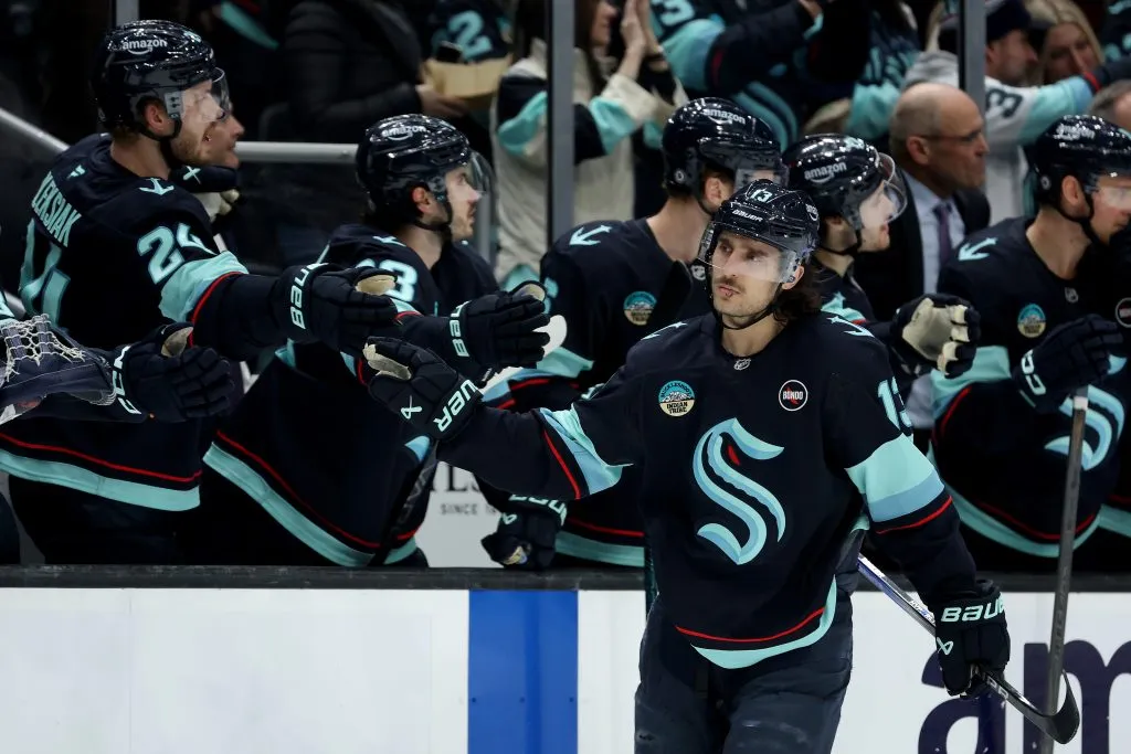 SEATTLE, WASHINGTON – FEBRUARY 02: Brandon Tanev #13 of the Seattle Kraken celebrates his goal against the Calgary Flames during the third period at Climate Pledge Arena on February 02, 2025 in Seattle, Washington. (Photo by Steph Chambers/Getty Images)
