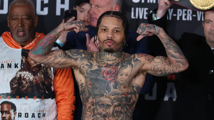 Gervonta Davis steps on the scale and poses at the weigh in defending his WBA lightweight title bout against Lamont Roach Jr.at Barclays Center on February 28, 2025 in New York City.