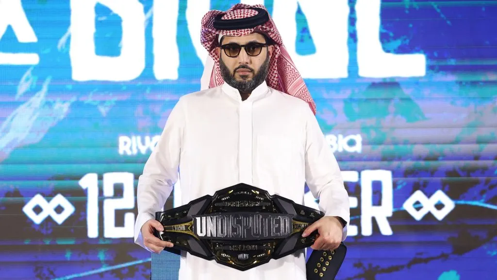 Turki Alalshikh, Chairman of the General Entertainment Authority, looks on as he holds the Undisputed belt during the weigh-in as part of the Riyadh Season – IV Crown Showdown at The Venue on October 11, 2024 in Riyadh, Saudi Arabia. (Photo by Richard Pelham/Getty Images)