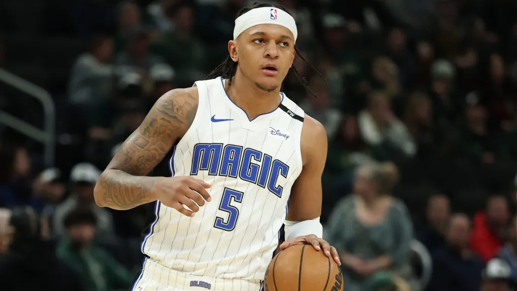 Paolo Banchero #5 of the Orlando Magic handles the ball during a game against the Milwaukee Bucks at Fiserv Forum. (Stacy Revere/Getty Images)