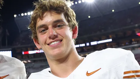 Cole Hutson #54 and Arch Manning #16 of the Texas Longhorns pose after defeating Alabama Crimson Tide 34-24 at Bryant-Denny Stadium on September 09, 2023 in Tuscaloosa, Alabama.
