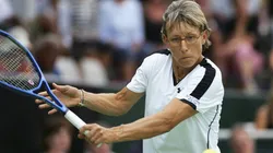 Martina Navratilova hits a return during her exhibition match against Monica Seles at the ASB Tennis Centre in Auckland.