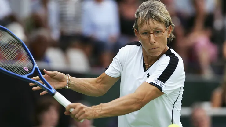 Martina Navratilova hits a return during her exhibition match against Monica Seles at the ASB Tennis Centre in Auckland.