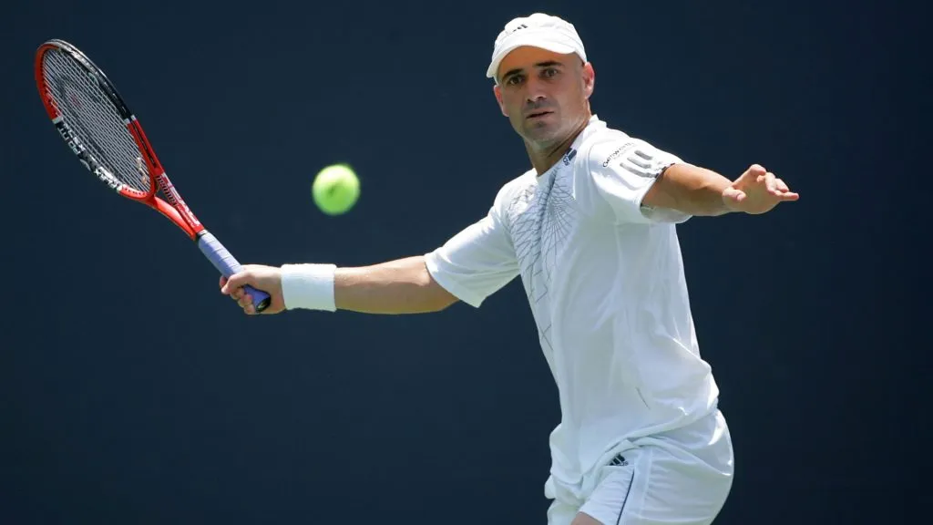 Andre Agassi eyes a forehand from Fernando Gonzalez of Chile during the quarterfinals of the Countrywide Classic at the Los Angeles Tennis Center. (Matthew Stockman/Getty Images)