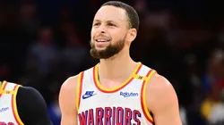Stephen Curry #30 and Gary Payton II #0 of the Golden State Warriors react in the second half against the Orlando Magic at Kia Center on February 27, 2025 in Orlando, Florida.