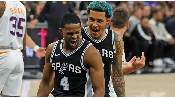De'Aaron Fox #4 of the San Antonio Spurs celebrates after his basket with teammate Jeremy Sochan #10 in the second half against the Phoenix Suns at Moody Center on February 20, 2025 in Austin, Texas.