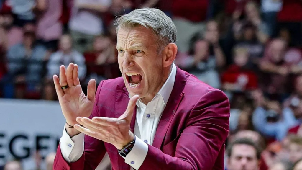 Head coach Nate Oats of the Alabama Crimson Tide reacts after a big second half play by his team against the Auburn Tigers at Coleman Coliseum on February 15, 2025 in Tuscaloosa, Alabama.