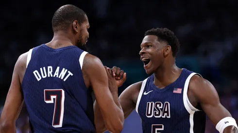 Kevin Durant #7 and Anthony Edwards #5 of Team United States high five during the first half of the Men's Group Phase - Group C game between Serbia and the United States on day two of the Olympic Games Paris 2024 at Stade Pierre Mauroy on July 28, 2024 in Lille, France.