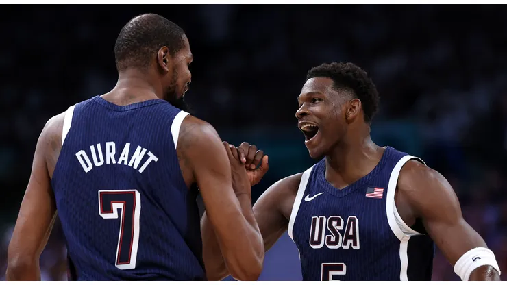 Kevin Durant #7 and Anthony Edwards #5 of Team United States high five during the first half of the Men's Group Phase - Group C game between Serbia and the United States on day two of the Olympic Games Paris 2024 at Stade Pierre Mauroy on July 28, 2024 in Lille, France.