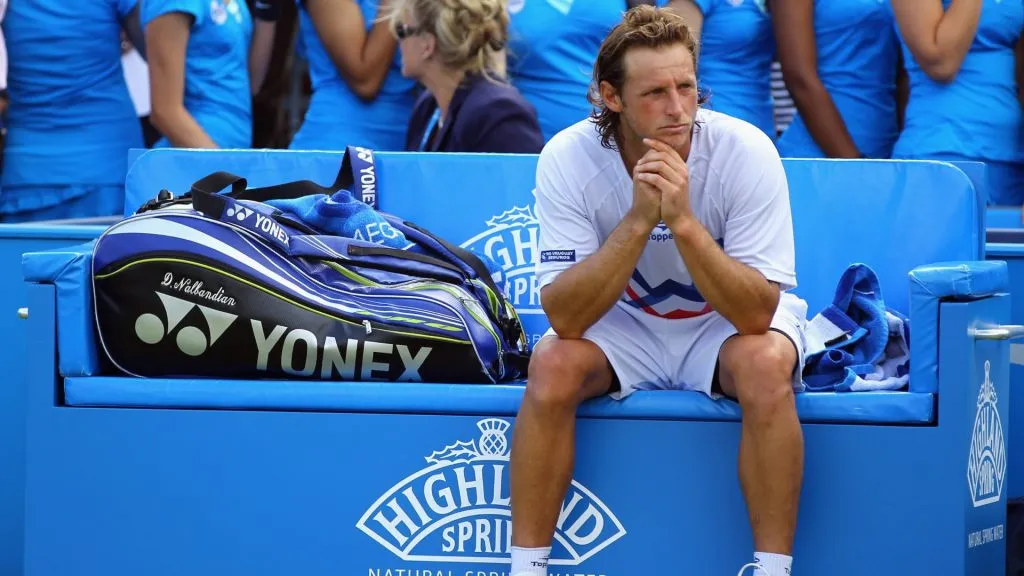 David Nalbandian of Argentina shows his dejection after learning of his disqualification for unsportsmanlike conduct during his mens singles final round in the AEGON Championships in 2012. (Source: Matthew Lewis/Getty Images)