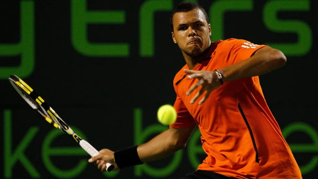 Jo-Wilfried Tsonga of France returns a shot against Rafael Nadal of Spain during day nine of the 2010 Sony Ericsson Open. (Source: Matthew Stockman/Getty Images)