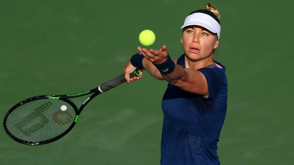 Vera Zvonareva of Russia serves against Ons Jabeur during day two of the Dubai Duty Free Tennis at Dubai Duty Free Tennis Stadium on February 15, 2022. (Source: Francois Nel/Getty Images)