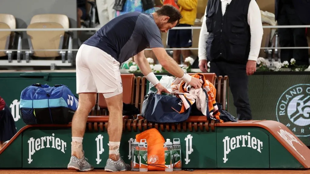 Andy Murray of Great Britain packs his bags after defeat to Stan Wawrinka of Switzerland in the Men’s Singles First Round match on Day One of the 2024 French Open. (Source: Clive Brunskill/Getty Images)