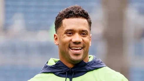 Russell Wilson participates in warmups prior to a game against the New Orleans Saints at Lumen Field on October 25, 2021 in Seattle, Washington.