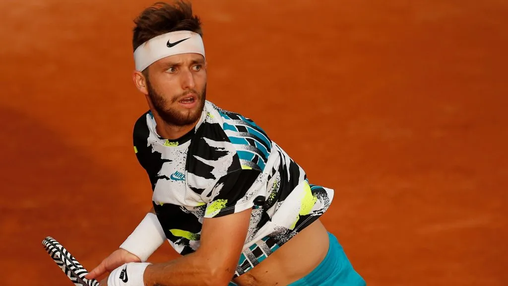 Corentin Moutet of France plays a forehand during his Men’s Singles first round match against Lorenzo Giustino of Italy on day two of the 2020 French Open. (Source: Clive Brunskill/Getty Images)
