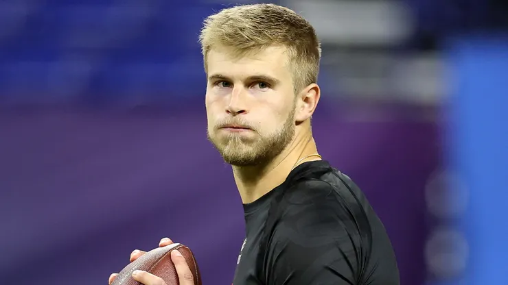 Tyler Shough #QB14 of Louisville participates in a drill during the NFL Scouting Combine at Lucas Oil Stadium on March 01, 2025 in Indianapolis, Indiana.
