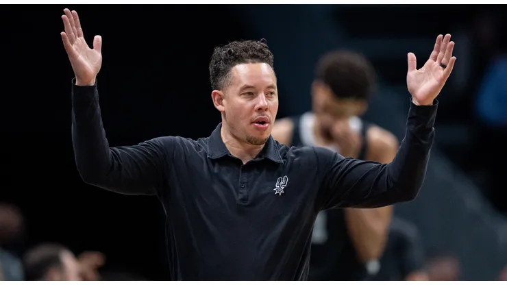 Interim head coach Mitch Johnson of the San Antonio Spurs looks on in the second quarter during their game against the Charlotte Hornets at Spectrum Center on February 07, 2025 in Charlotte, North Carolina.
