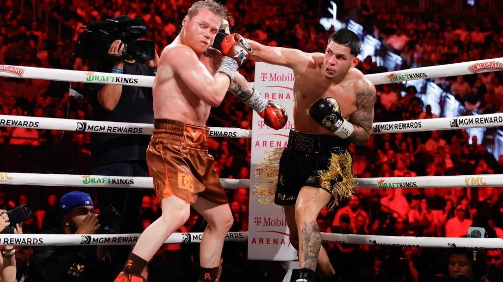 Edgar Berlanga (R) punches WBC/WBA/WBO super middleweight champion Canelo Alvarez during the sixth round of a title fight at T-Mobile Arena on September 14, 2024 in Las Vegas, Nevada. (Photo by Steve Marcus/Getty Images)