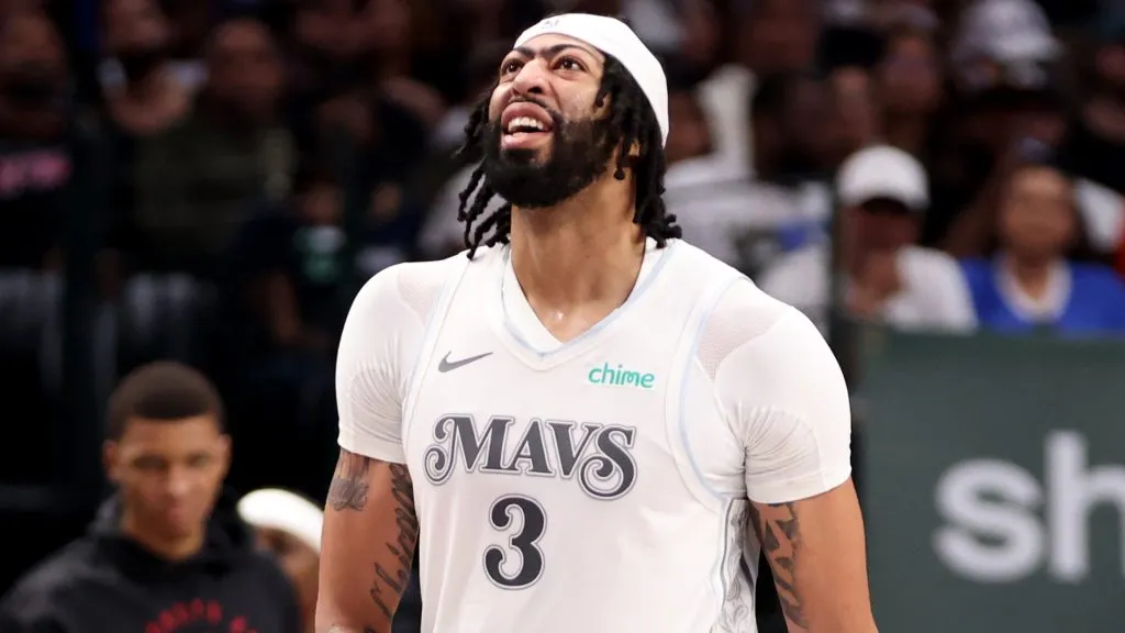 Anthony Davis #3 of the Dallas Mavericks leaves the court with an injury during the third quarter against the Houston Rockets.