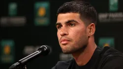 Carlos Alcaraz speaks during a press conference.