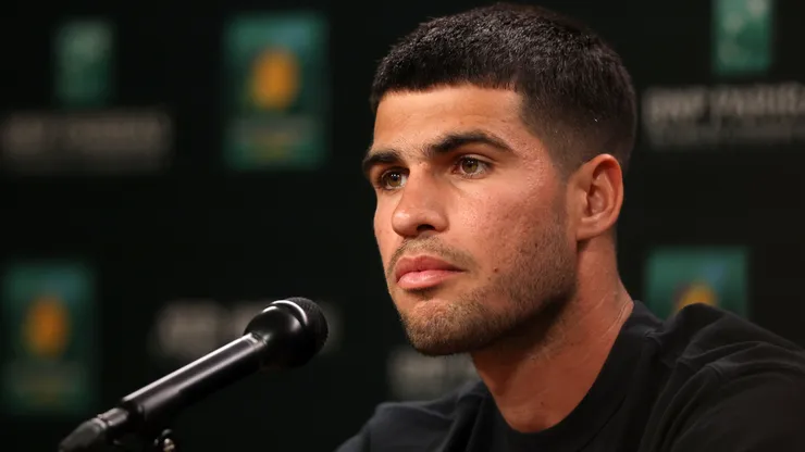 Carlos Alcaraz speaks during a press conference.