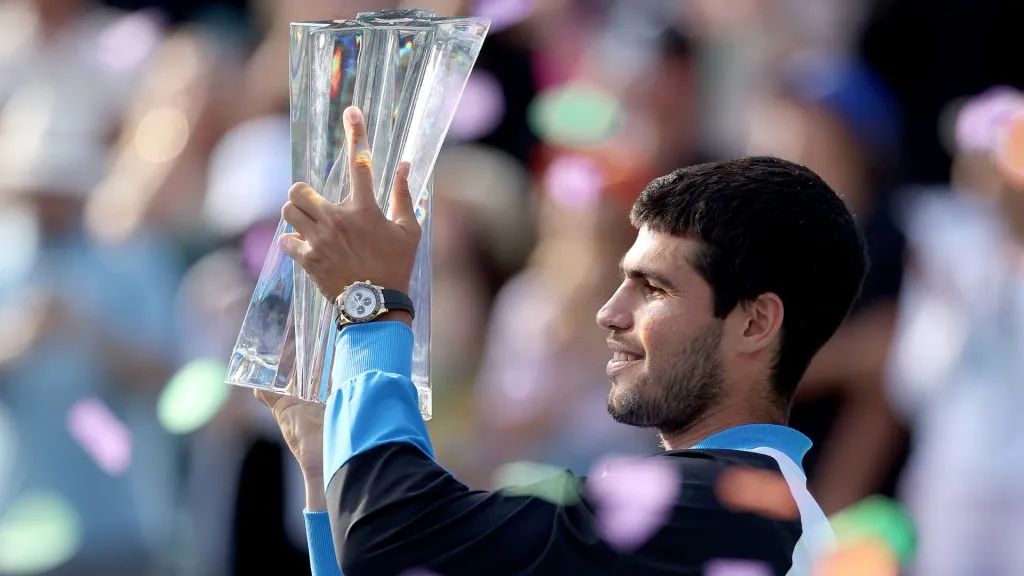 Carlos Alcaraz of Spain poses with the trophy after defeating Daniil Medvedev of Russia during the Men’s Final of the BNP Paribas Open at Indian Wells Tennis Garden. (Matthew Stockman/Getty Images)