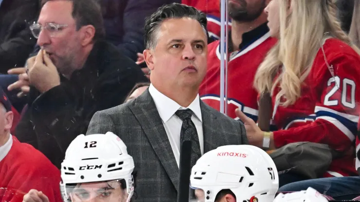 Head coach Travis Green of the Ottawa Senators handles bench duties during the third period against the Montreal Canadiens at the Bell Centre on October 12, 2024 in Montreal, Quebec, Canada.
