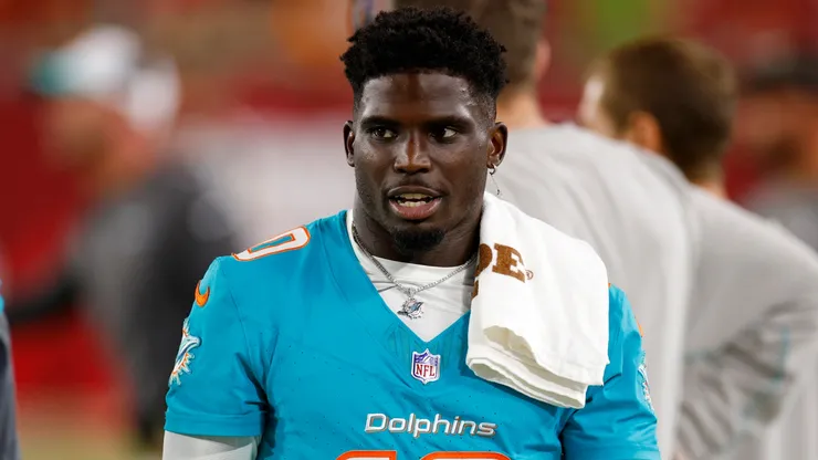 Tyreek Hill #10 of the Miami Dolphins looks on during a preseason game against the Tampa Bay Buccaneers at Raymond James Stadium on August 23, 2024.