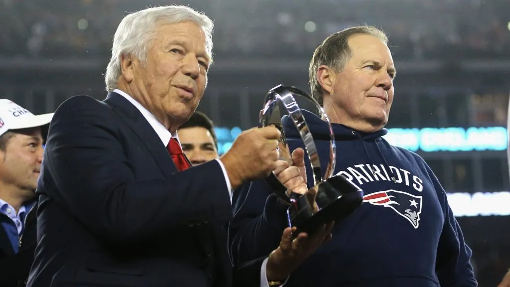 Robert Kraft and head coach Bill Belichick of the New England Patriots hold the Lamar Hunt Trophy at the AFC Championship Game in 2017. (Source: Maddie Meyer/Getty Images)