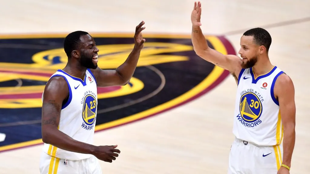 Draymond Green #23 of the Golden State Warriors celebrates with Stephen Curry #30 in the first quarter against the Cleveland Cavaliers during Game Three of the 2018 NBA Finals. (Jamie Sabau/Getty Images)