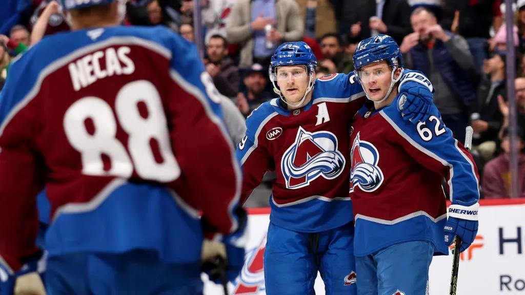 Artturi Lehkonen #62 and Nathan MacKinnon #29 of the Colorado Avalanche celebrate a goal against the Pittsburgh Penguins in the second period at Ball Arena on March 4, 2025 in Denver, Colorado. (Photo by Jamie Schwaberow/Getty Images)