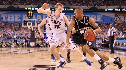 Shawn Vanzant #2 of the Butler Bulldogs drives on Kyle Singler #12 of the Duke Blue Devils in the second half during the 2010 NCAA Division I Men's Basketball National Championship game.