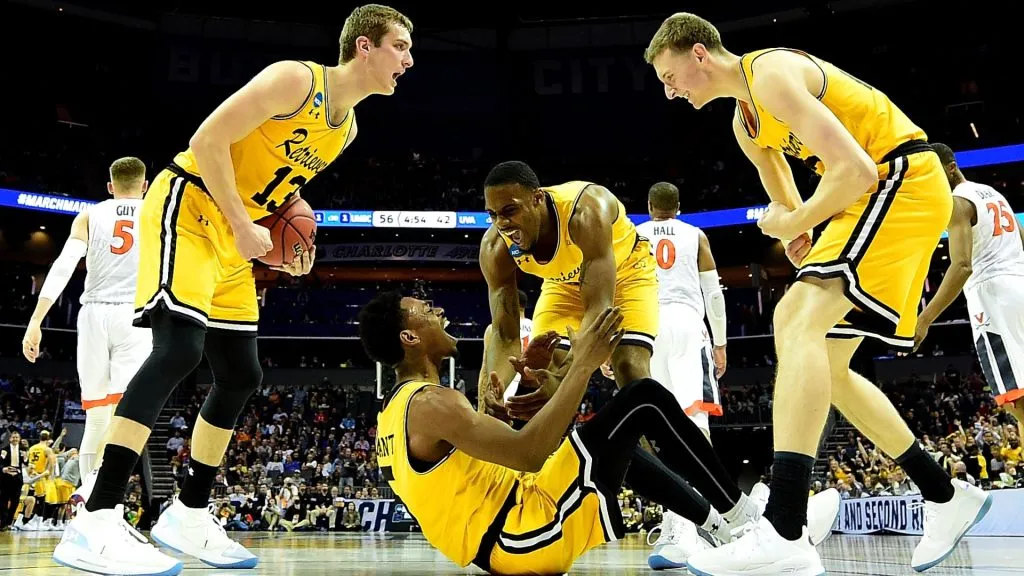 Jourdan Grant and teammate Arkel Lamar react after a score against the Virginia Cavaliers during the first round of the 2018 NCAA Men’s Basketball Tournament. (Source: Streeter Lecka/Getty Images)