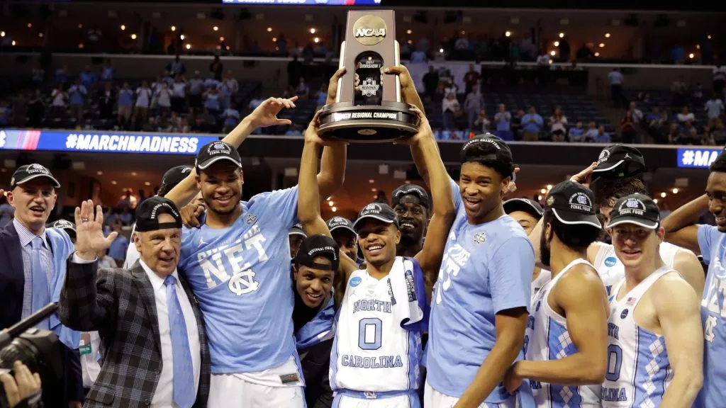 The North Carolina Tar Heels hold up the South Regional Champion trophy after defeating the Kentucky Wildcats during the 2017 NCAA Men’s Basketball Tournament South Regional. (Source: Andy Lyons/Getty Images)