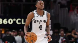 De'Aaron Fox #4 of the San Antonio Spurs pushes the ball up the court against the Atlanta Hawks during the fourth quarter at State Farm Arena on February 05, 2025 in Atlanta, Georgia.