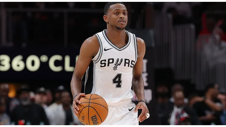 De'Aaron Fox #4 of the San Antonio Spurs pushes the ball up the court against the Atlanta Hawks during the fourth quarter at State Farm Arena on February 05, 2025 in Atlanta, Georgia.