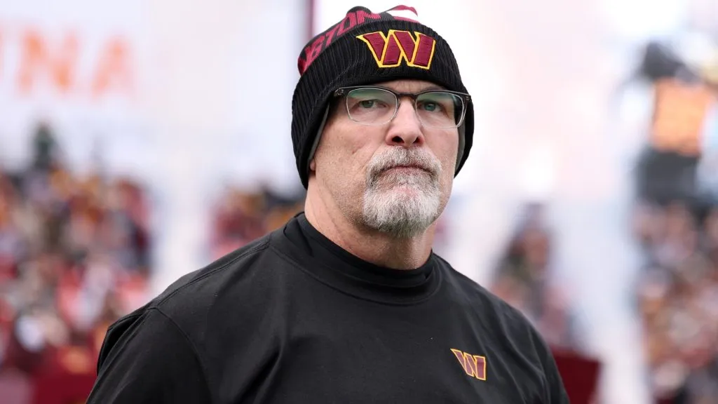 Head coach Dan Quinn of the Washington Commanders looks on before a game between the Commanders and the Tennessee Titans at Northwest Stadium on December 01, 2024. (Source: Scott Taetsch/Getty Images)