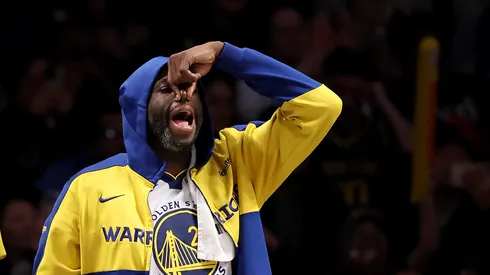 Draymond Green #23 of the Golden State Warriors reacts from the bench in the fourth quarter against the Brooklyn Nets