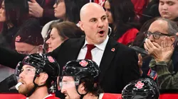 Rick Tocchet of Team Canada handles the bench during the first period against Team USA in the 2025 NHL 4 Nations Face-Off at the Bell Centre on February 15, 2025 in Montreal, Quebec, Canada.