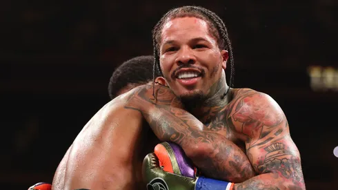 Gervonta Davis smiles in a clinch with Lamont Roach Jr. during their bout for Davis' WBA lightweight title at Barclays Center on March 01, 2025 in New York City.