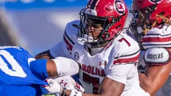 Nick Emmanwori #7 of the South Carolina Gamecocks tries to make the tackle on Demie Sumo-Karngbaye #0 of the Kentucky Wildcats at Kroger Field on September 7, 2024 in Lexington, Kentucky.