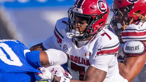 Nick Emmanwori #7 of the South Carolina Gamecocks tries to make the tackle on Demie Sumo-Karngbaye #0 of the Kentucky Wildcats at Kroger Field on September 7, 2024 in Lexington, Kentucky.