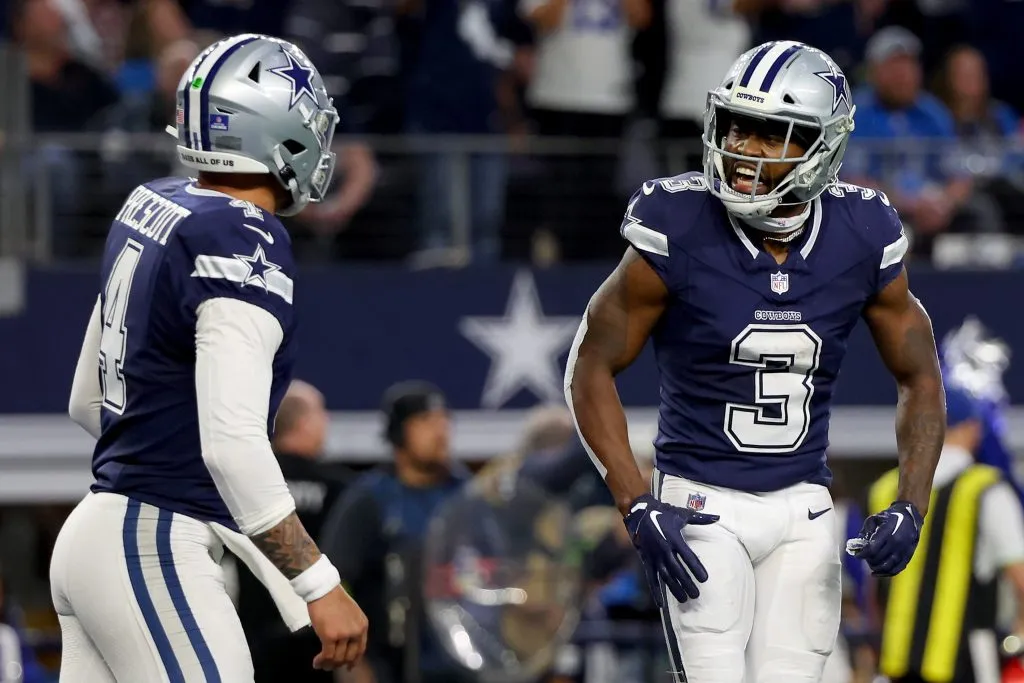 ARLINGTON, TEXAS – DECEMBER 30: Brandin Cooks #3 of the Dallas Cowboys celebrates with Dak Prescott #4 after scoring a touchdown against the Detroit Lions during the fourth quarter in the game at AT&amp;T Stadium on December 30, 2023 in Arlington, Texas. (Photo by Richard Rodriguez/Getty Images)