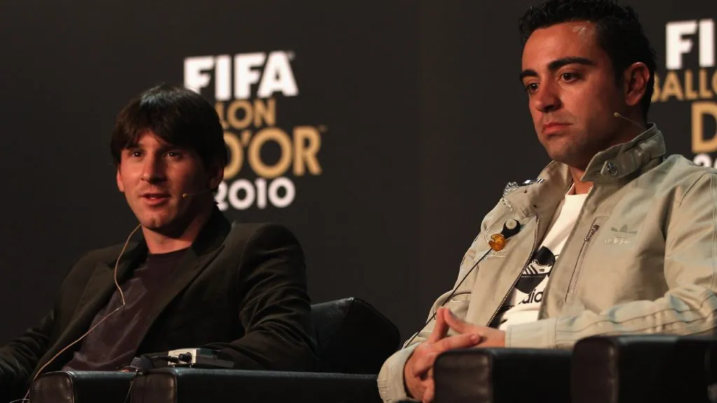 Lionel Messi of Argentina alongside Xavi during a press conference ahead of the FIFA Ballon d’or in 2011. (Michael Steele/Getty Images)