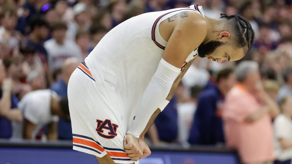 Johni Broome #4 of the Auburn Tigers reacts to losing in overtime to the Alabama Crimson Tide at Neville Arena on March 8, 2025 in Auburn, Alabama.