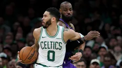Los Angeles Lakers' LeBron James defends Boston Celtics' Jayson Tatum.