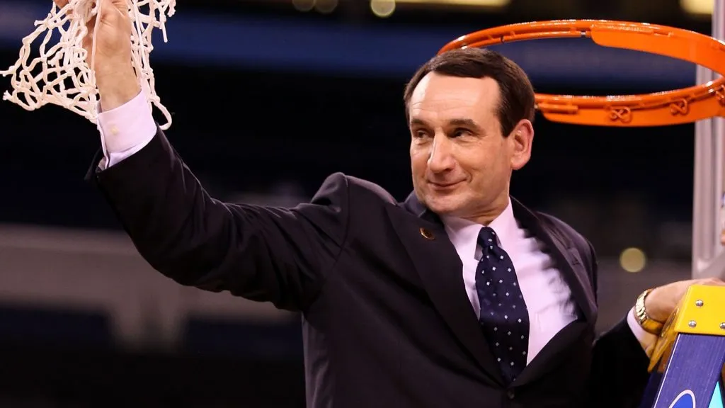 Mike Krzyzewski of the Duke Blue Devils cuts down a piece of the net following their 61-59 win against the Butler Bulldogs during the 2010 NCAA Division I Men’s Basketball National Championship game. (Source: Andy Lyons/Getty Images)