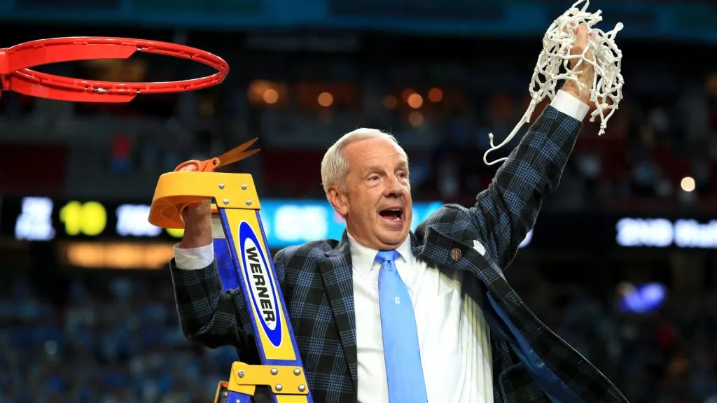 Roy Williams of the North Carolina Tar Heels cuts down the net after defeating the Gonzaga Bulldogs during the 2017 NCAA Men’s Final Four National Championship game. (Source: Tom Pennington/Getty Images)